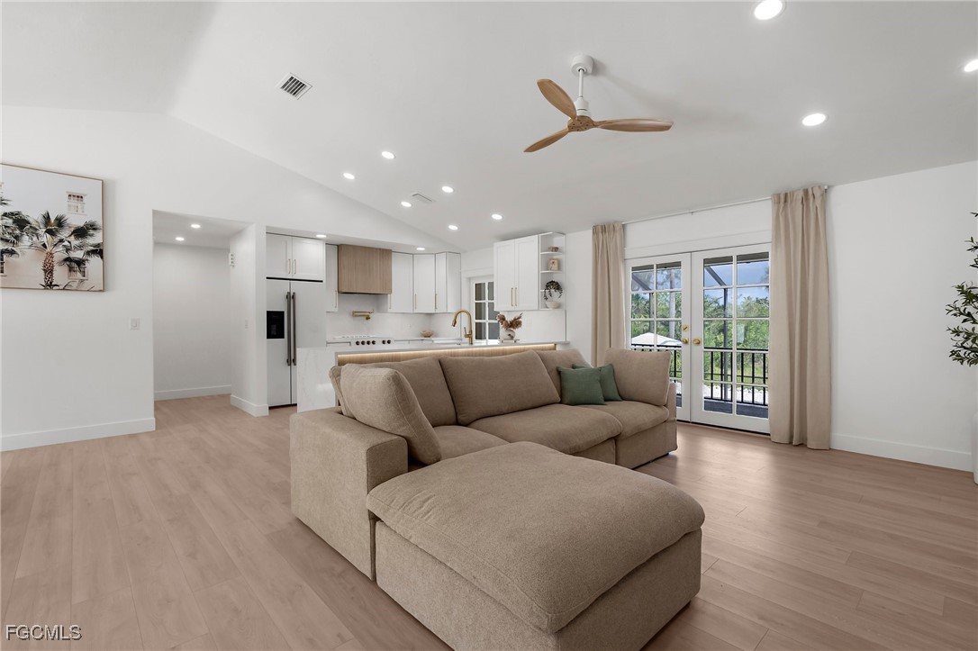 13270 Electron Drive Fort Myers, FL 33908 - Photo 6 of 47 a living room with furniture and a wooden floor