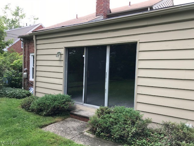4614 College Road South Euclid, OH 44121 - Photo 26 of 34 Back slider door off of family media room to back yard