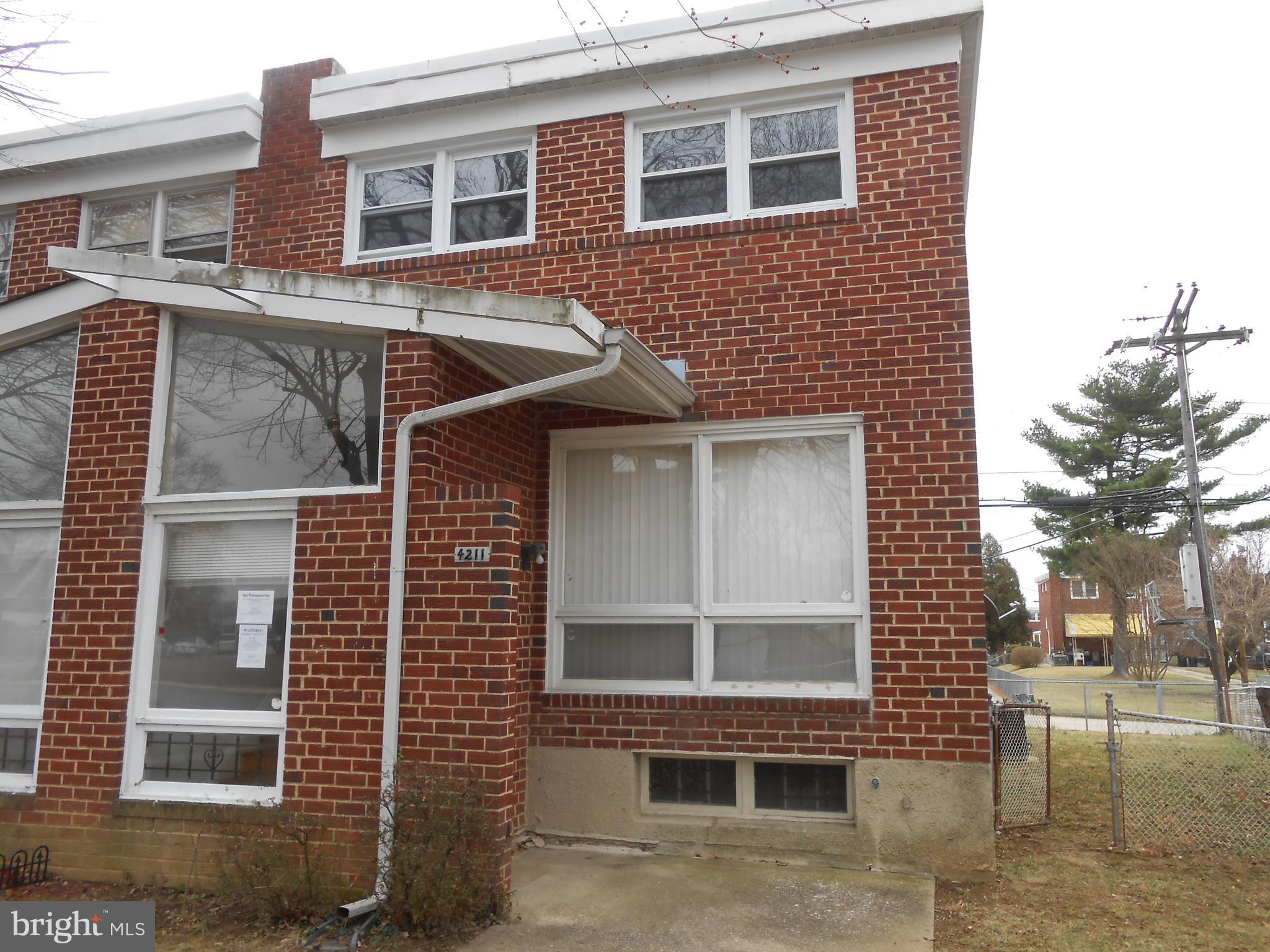 4211 Crest Heights Road Baltimore, MD 21215 - Photo 2 of 21 a front view of a house
