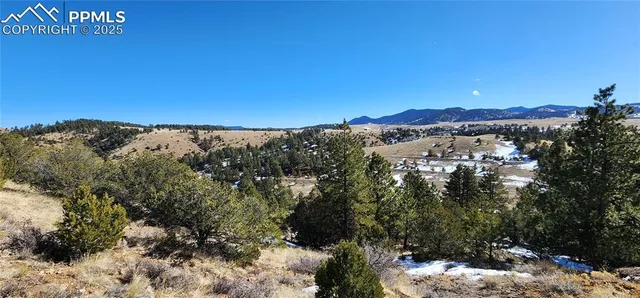 a view of city and mountain