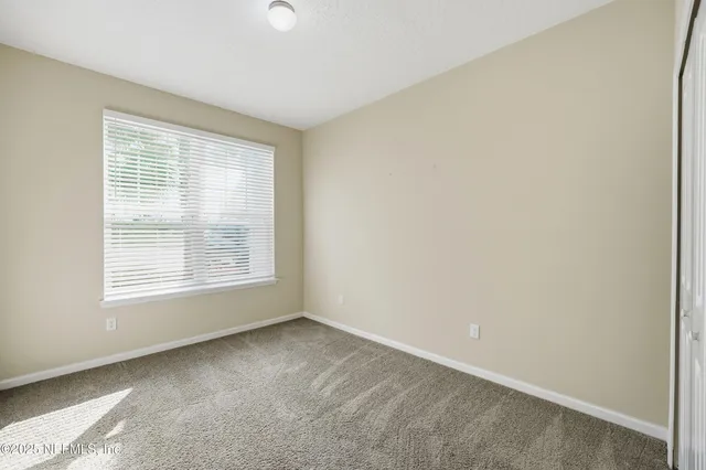 a bathroom with a shower and a bathtub