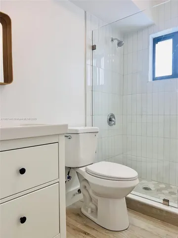 a view of a house with more windows and refrigerator