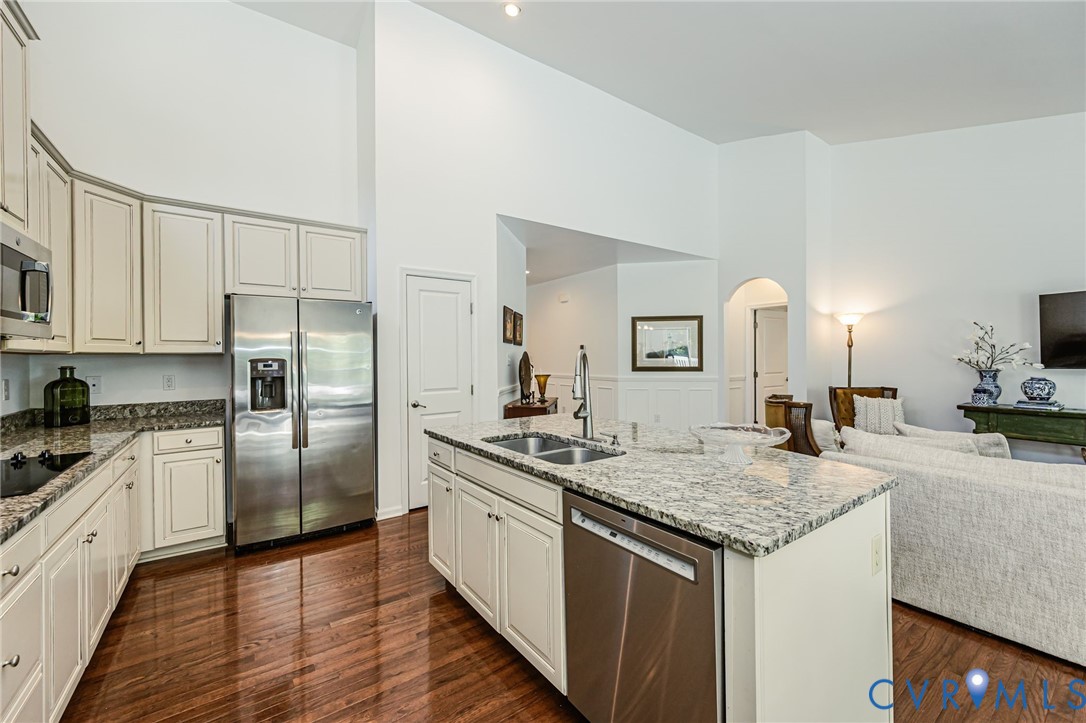 7435 Wicks Road Williamsburg, VA 23188 - Photo 27 of 82 Open-concept kitchen featuring an island with a do