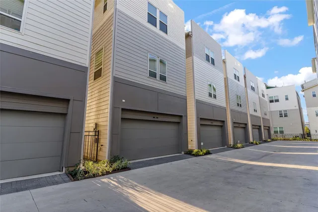 a view of a building with a street