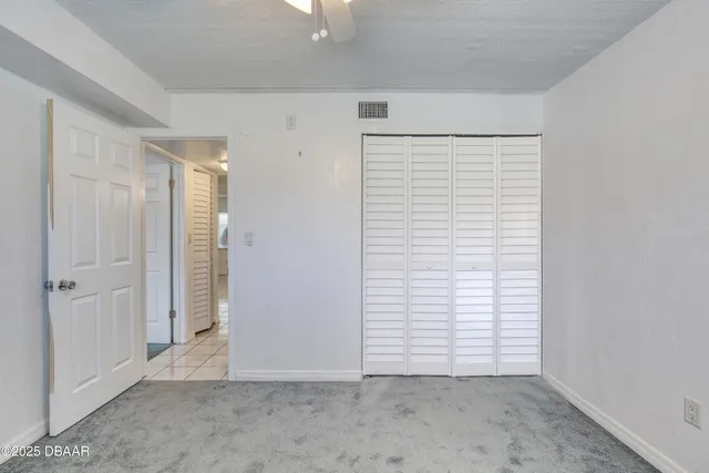 an empty room with closet