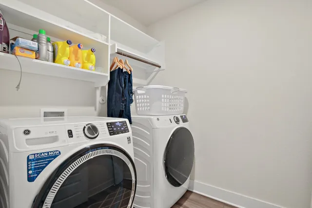 a utility room with dryer and washer