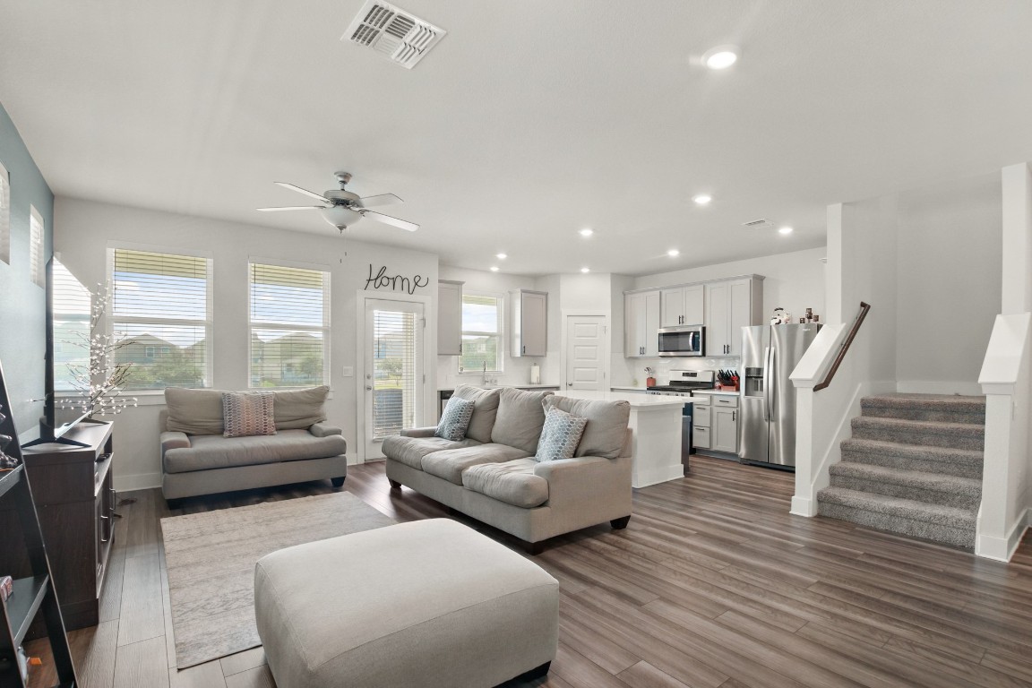 7507 Grand Linden Way Austin, TX 78744 - Photo 4 of 26 a living room with furniture and a large window