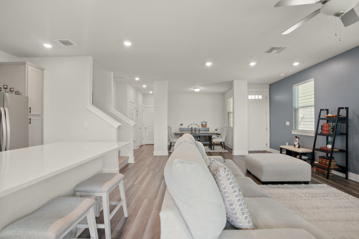 7507 Grand Linden Way Austin, TX 78744 - Photo 6 of 26 a living room with furniture and a large window