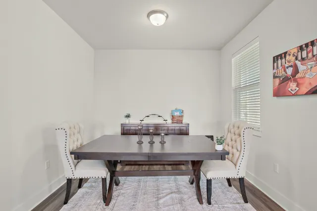 a view of a dining room with furniture