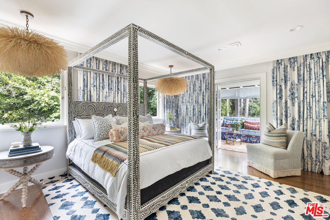 175 West Channel Road Santa Monica, CA 90402 - Photo 19 of 53 a bedroom with a bed and a couch