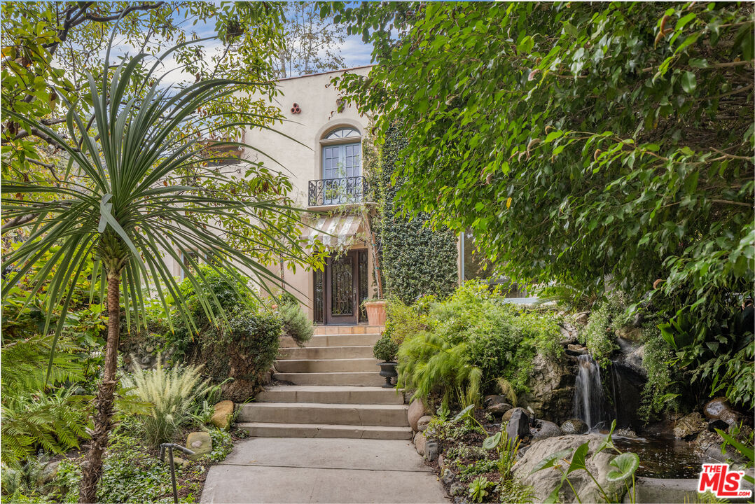175 West Channel Road Santa Monica, CA 90402 - Photo 2 of 53 a view of a garden with plants