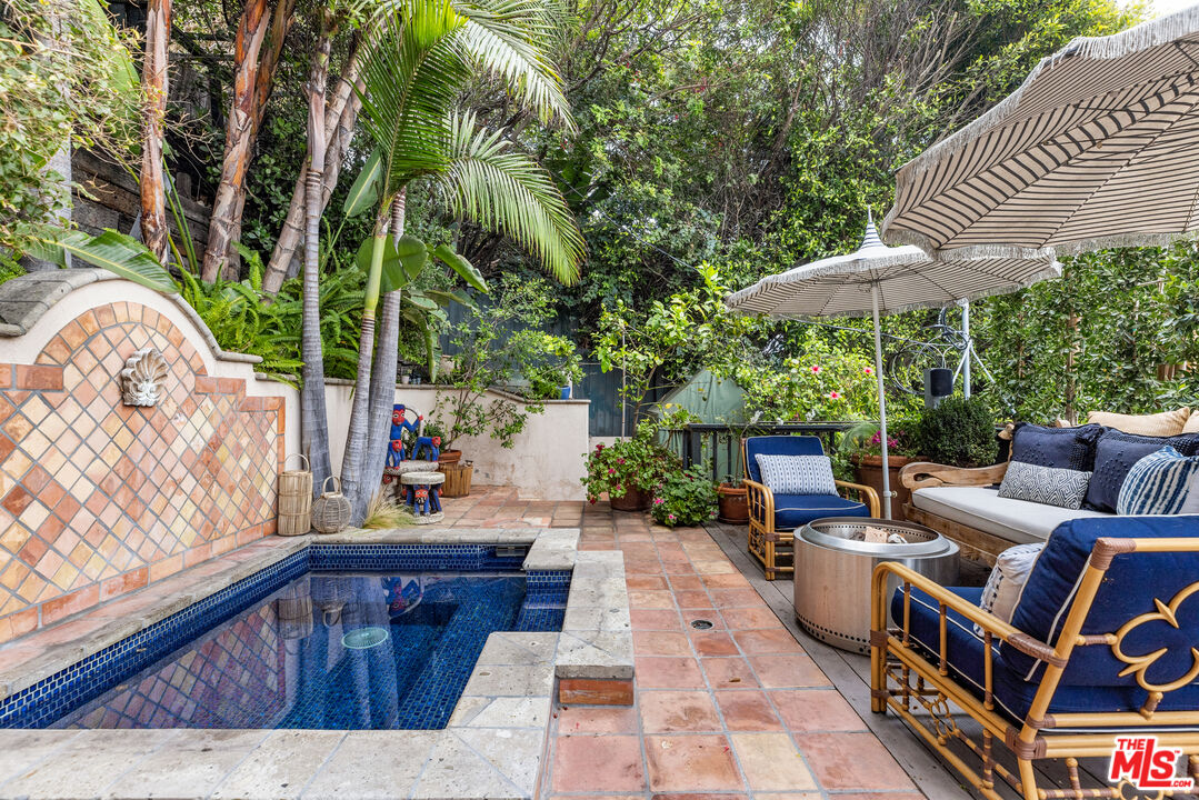 175 West Channel Road Santa Monica, CA 90402 - Photo 31 of 53 swimming pool view with a seating space