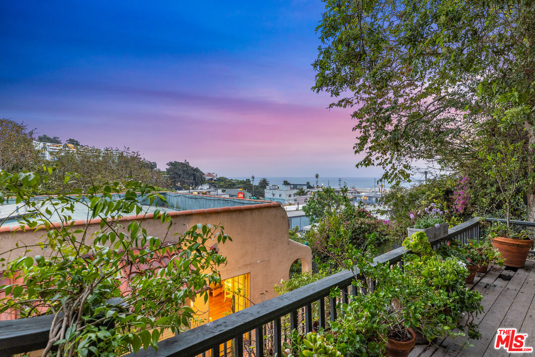 175 West Channel Road Santa Monica, CA 90402 - Photo 41 of 53 a view of a lake from a balcony