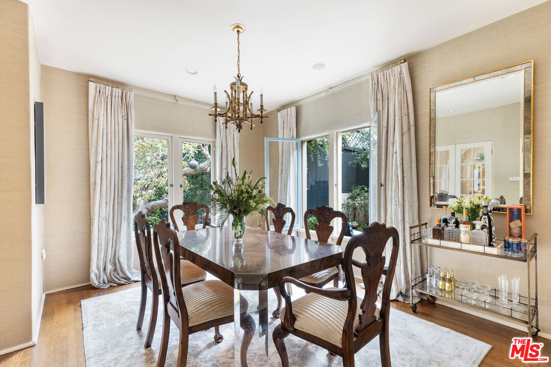 175 West Channel Road Santa Monica, CA 90402 - Photo 9 of 53 a view of a dining room with furniture window and outside view