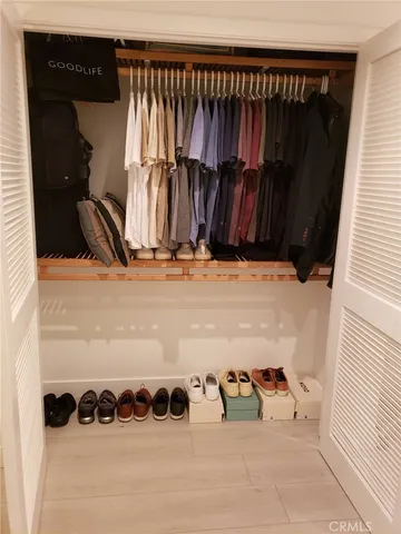 a view of a chairs and table in a backyard