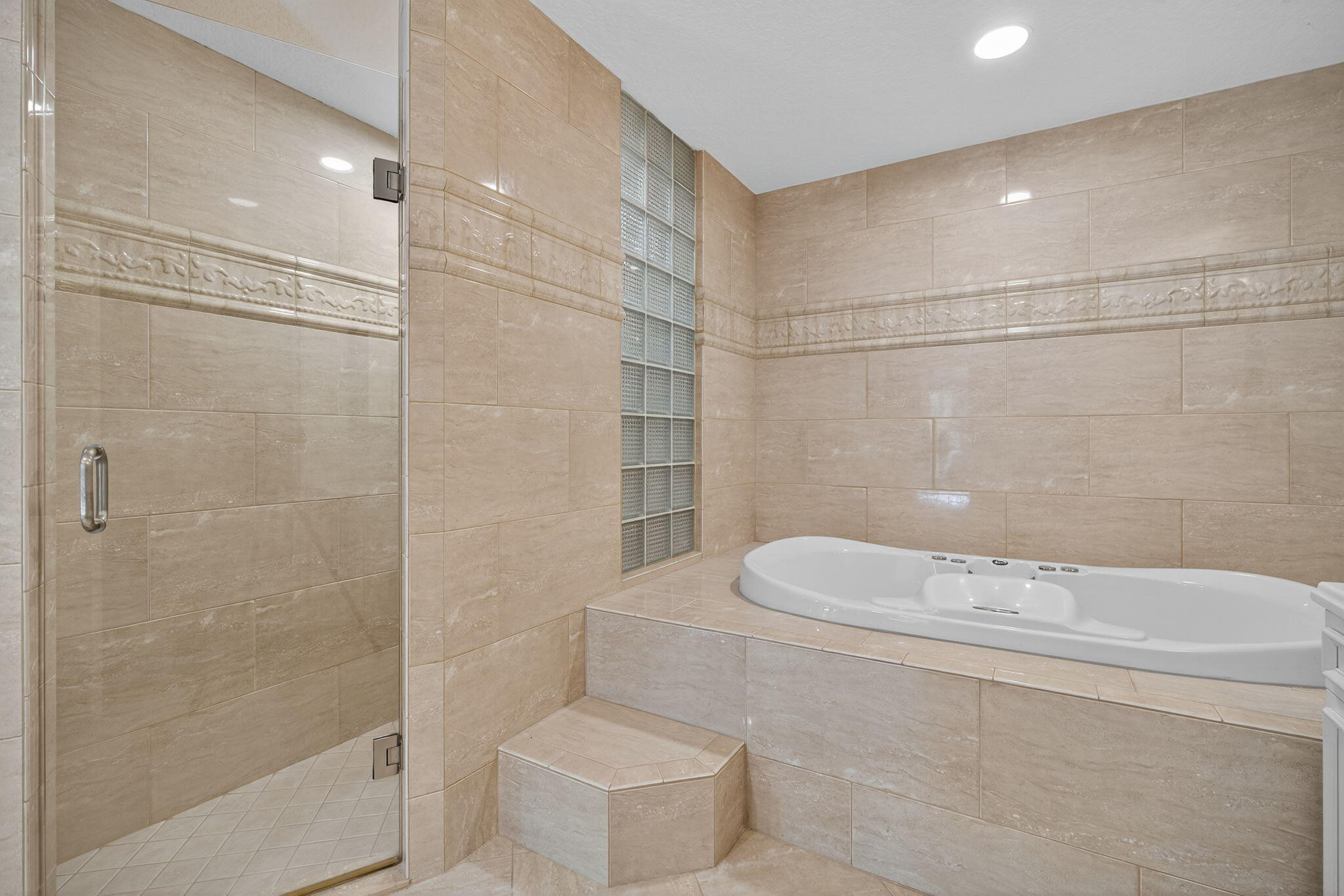 121 Landward Drive Jupiter, FL 33477 - Photo 32 of 80 a bathroom with a toilet and shower