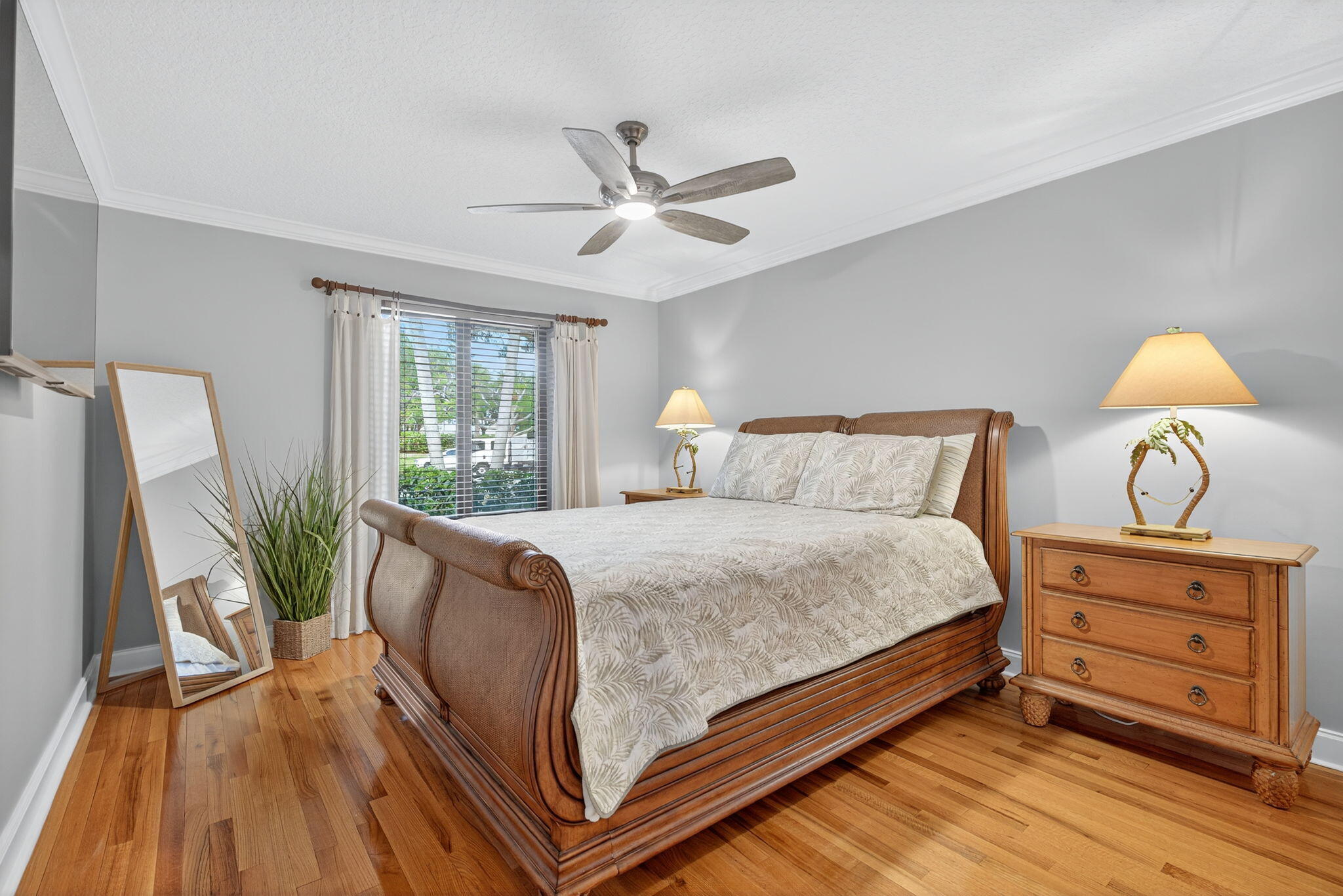 121 Landward Drive Jupiter, FL 33477 - Photo 36 of 80 a bedroom with a bed and a window