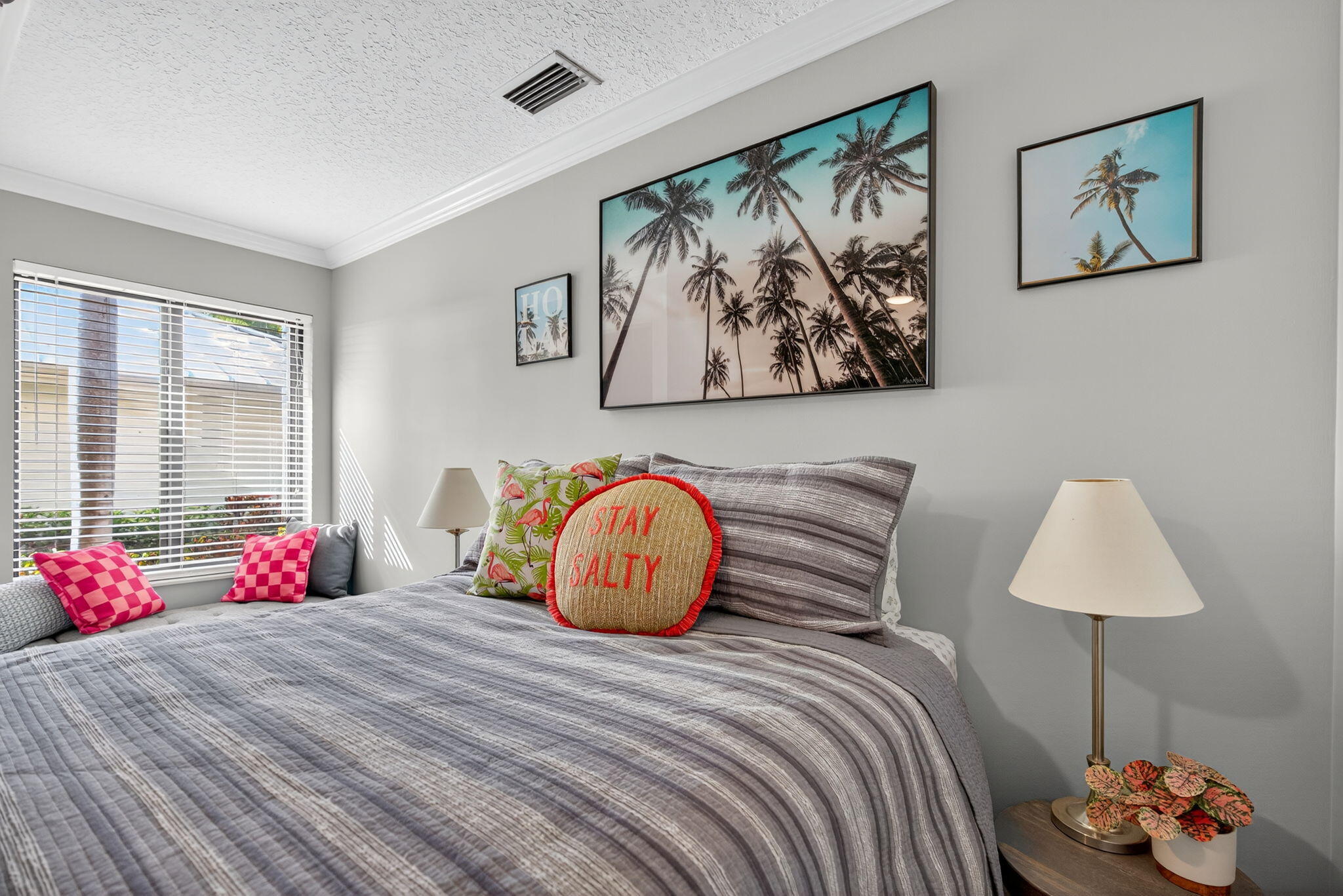 121 Landward Drive Jupiter, FL 33477 - Photo 38 of 80 a bedroom with a bed and a window