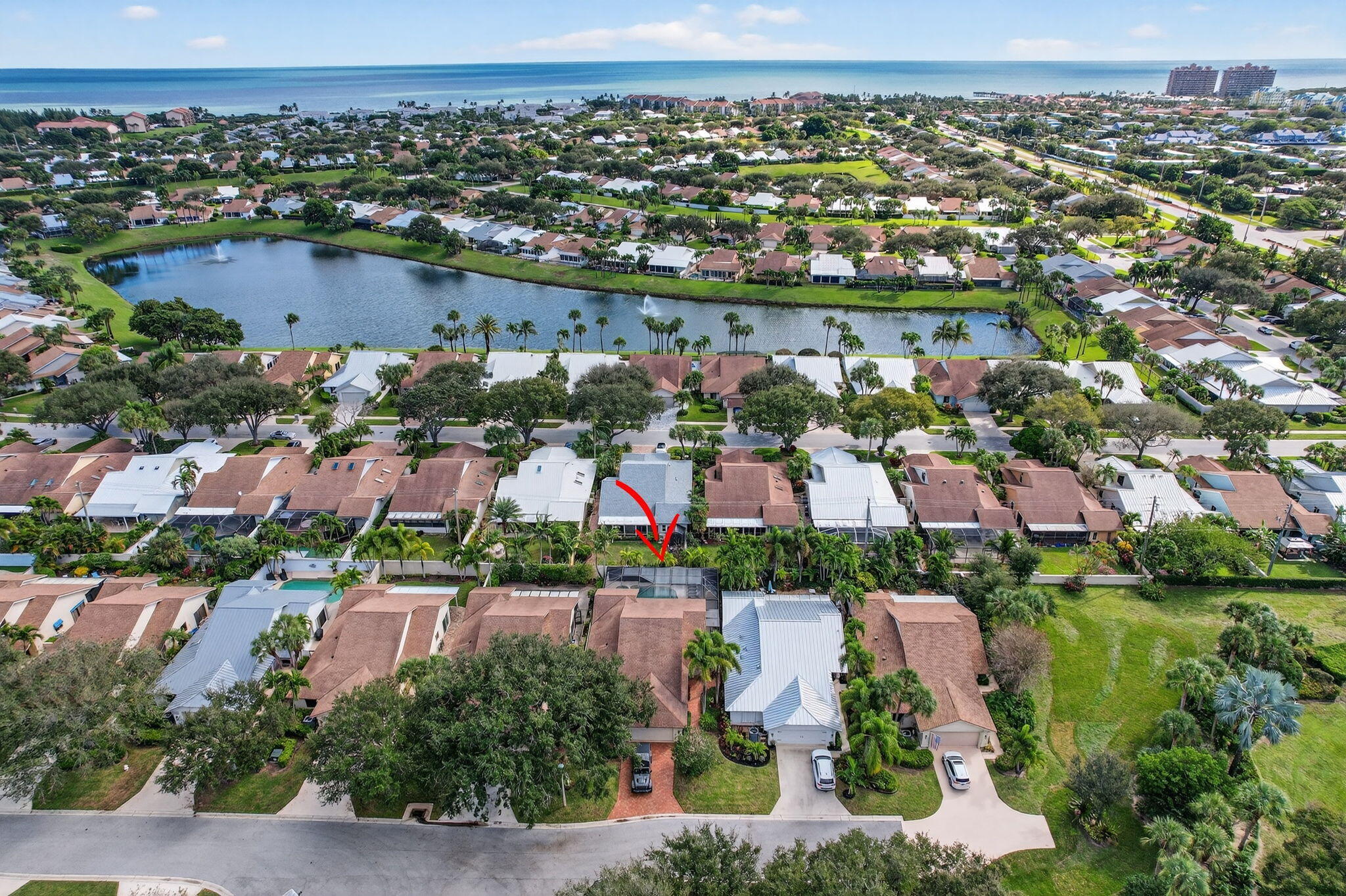 121 Landward Drive Jupiter, FL 33477 - Photo 67 of 80 an aerial view of a city with houses