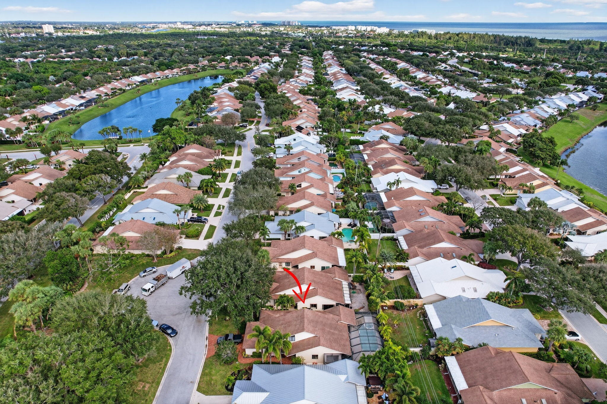 121 Landward Drive Jupiter, FL 33477 - Photo 69 of 80 an aerial view of residential houses with outdoor space