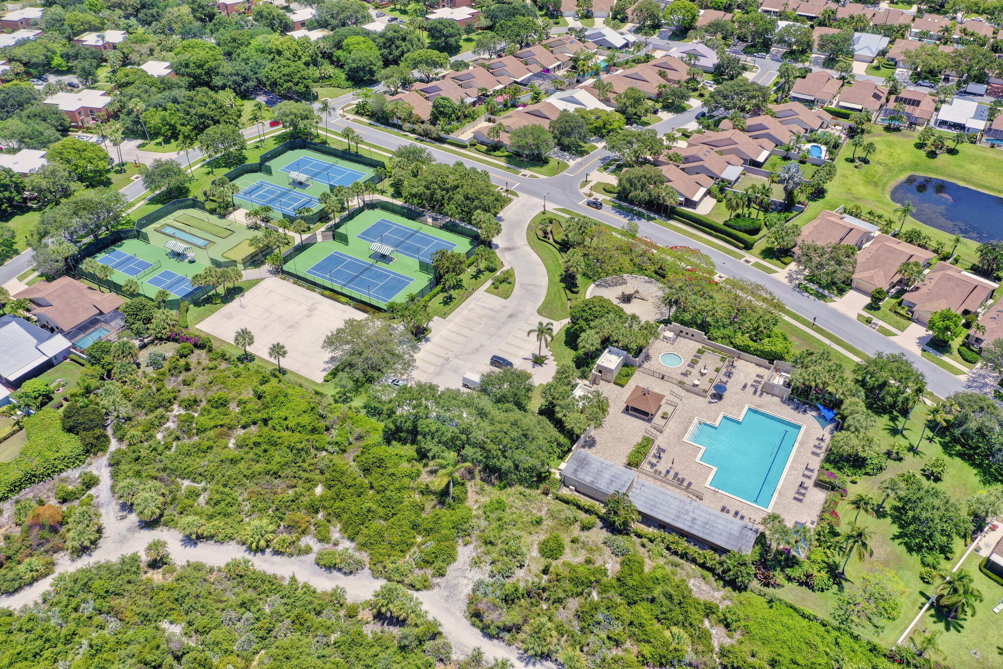 121 Landward Drive Jupiter, FL 33477 - Photo 72 of 80 an aerial view of residential houses with outdoor space