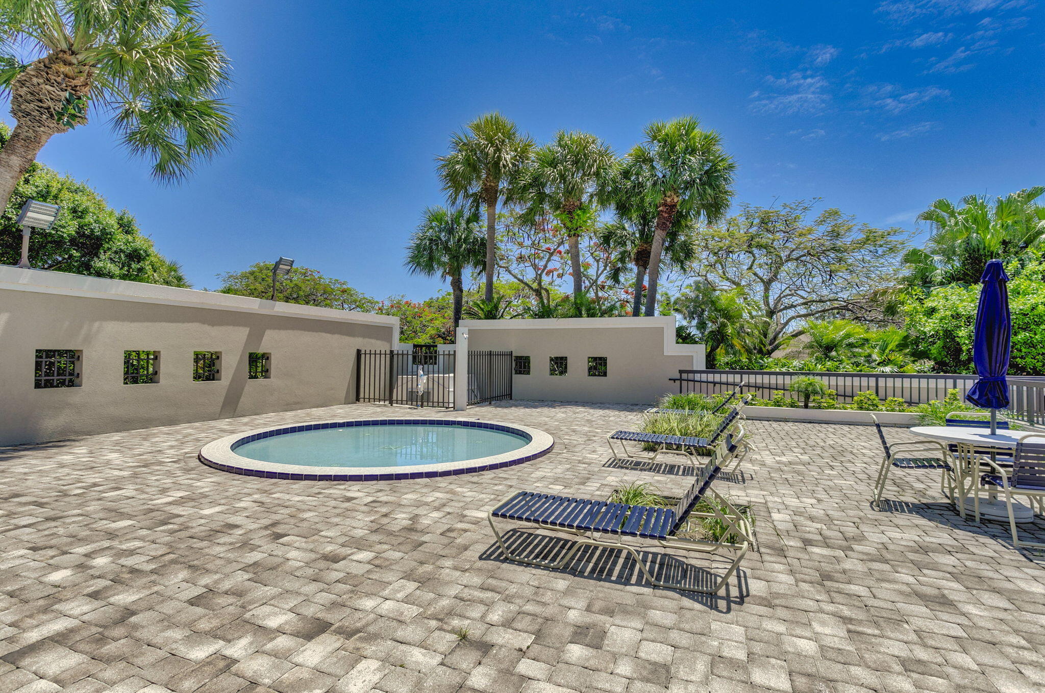 121 Landward Drive Jupiter, FL 33477 - Photo 77 of 80 a outdoor space with furniture and garden