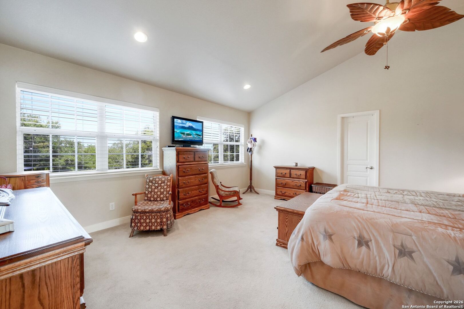 1367 Rolling Hills Road Blanco, TX 78606 - Photo 13 of 30 a bed room with a bed and a chair