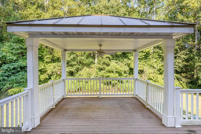 a view of a back yard from a balcony