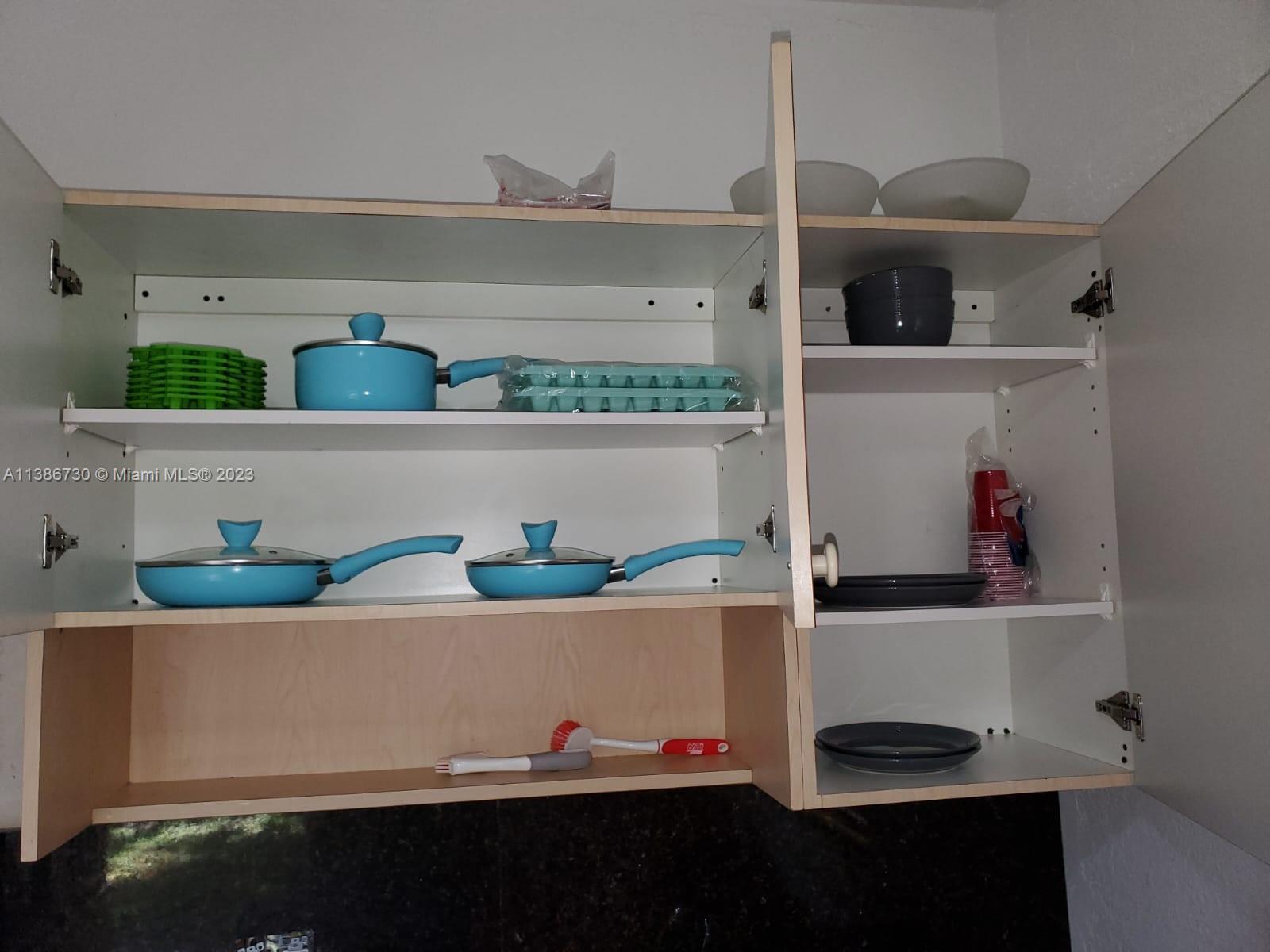 451 Northwest 82nd Street Miami, FL 33150 - Photo 21 of 27 In-Law Kitchen Cabinet