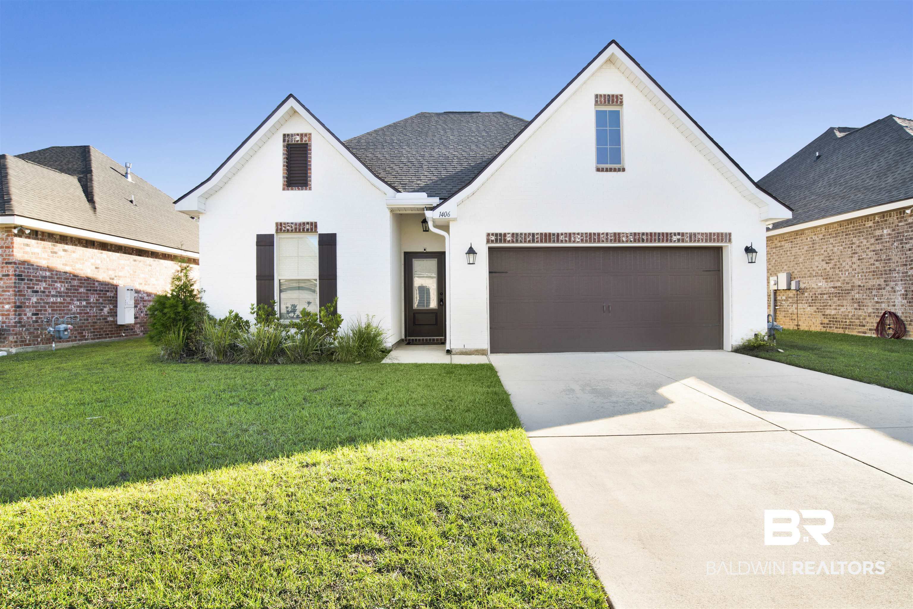 1406 Aldon Street Foley, AL 36535 - Photo 3 of 30 View of front facade featuring a front yard