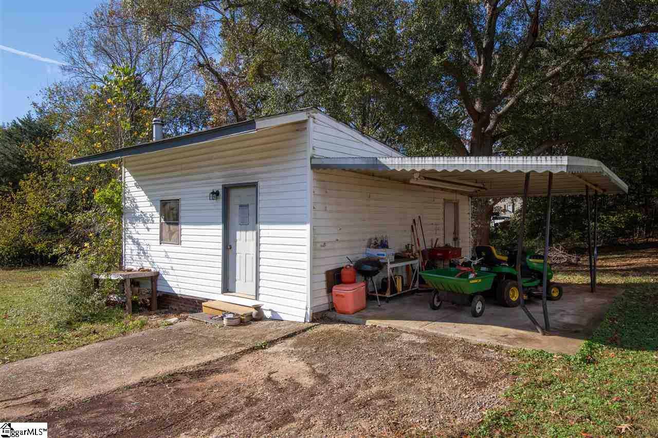391 South Bennetts Bridge Road Greer, SC 29651 - Photo 25 of 28 Outbuilding with electricity and carport