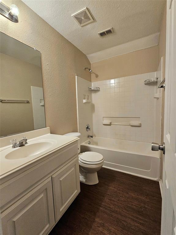 14224 Polo Ranch Street Fort Worth, TX 76052 - Photo 12 of 35 a bathroom with a sink a toilet and shower