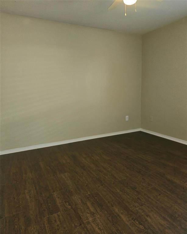 14224 Polo Ranch Street Fort Worth, TX 76052 - Photo 13 of 35 an empty room with wooden floor