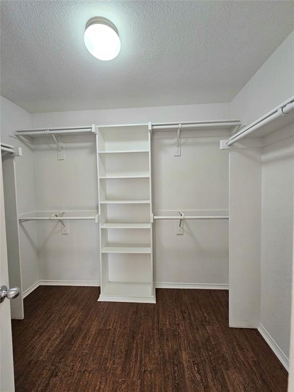14224 Polo Ranch Street Fort Worth, TX 76052 - Photo 19 of 35 a view of walk in closet with empty racks