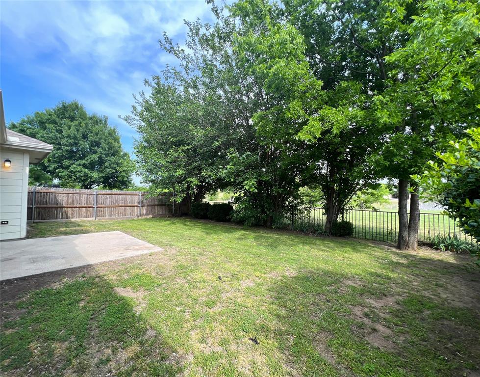 14224 Polo Ranch Street Fort Worth, TX 76052 - Photo 21 of 35 a view of backyard with green space