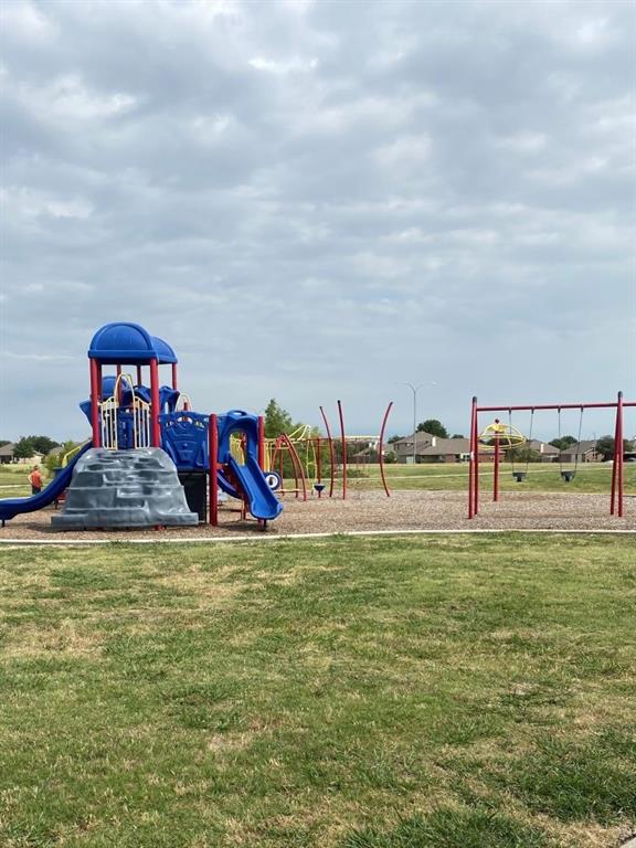 14224 Polo Ranch Street Fort Worth, TX 76052 - Photo 29 of 35 a view of a swimming pool with an outdoor seating