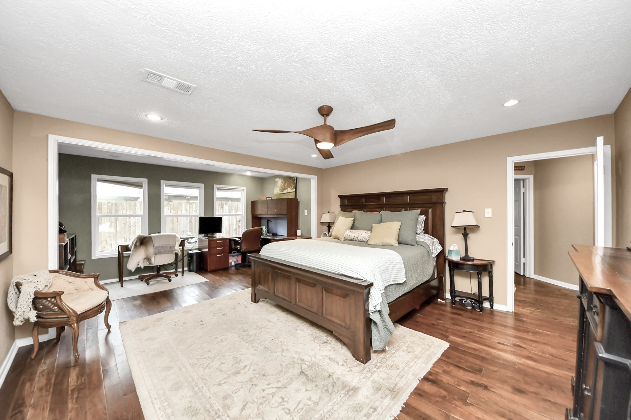 6403 Craigway Road Spring, TX 77389 - Photo 12 of 39 Expanded primary suite with real hardwood floors and sitting/office area