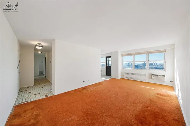 a view of an empty room with window