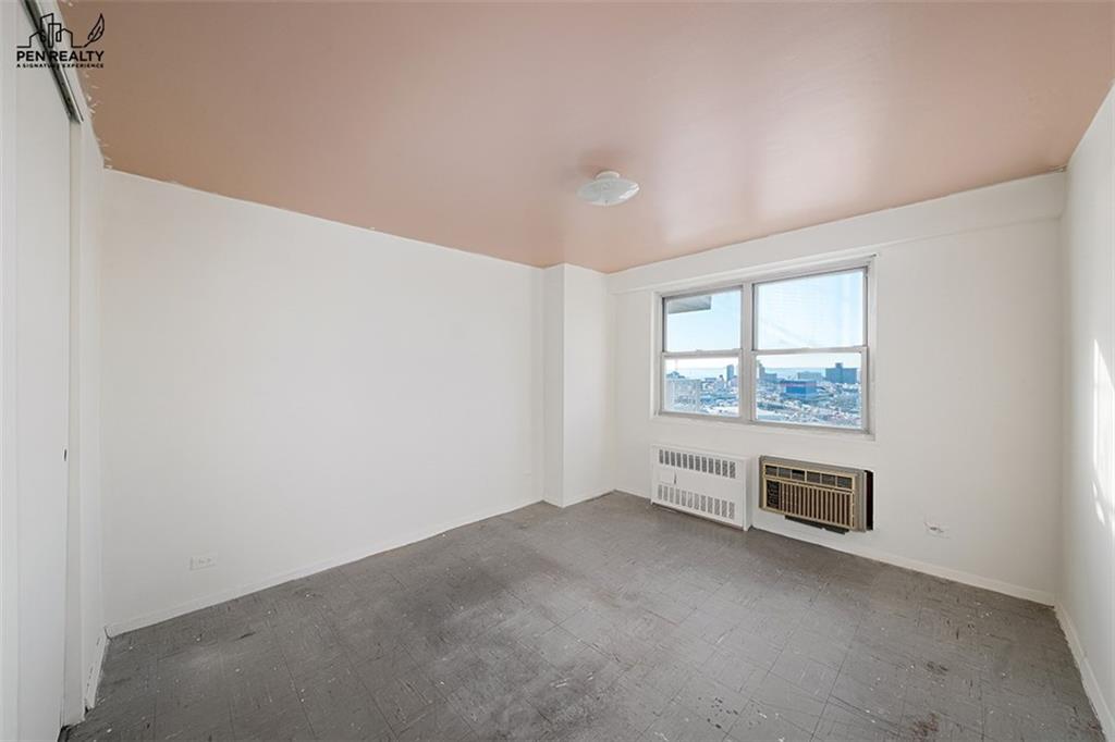 2475 West 16th Street, Unit 18G Brooklyn, NY 11214 - Photo 8 of 15 an empty room with windows