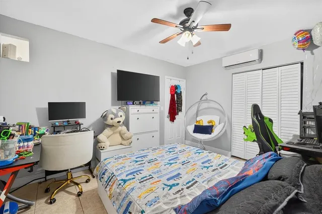 a view of a swimming pool with a seating space