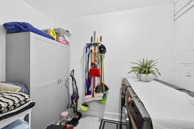 an aerial view of a house with swimming pool and outdoor space