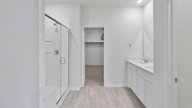 a view of a bathroom from the hallway