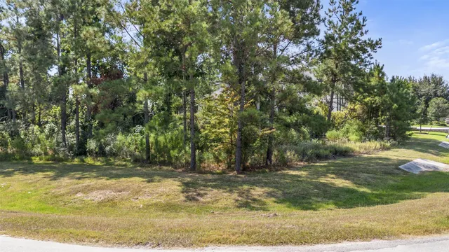 a view of a playground with basketball court