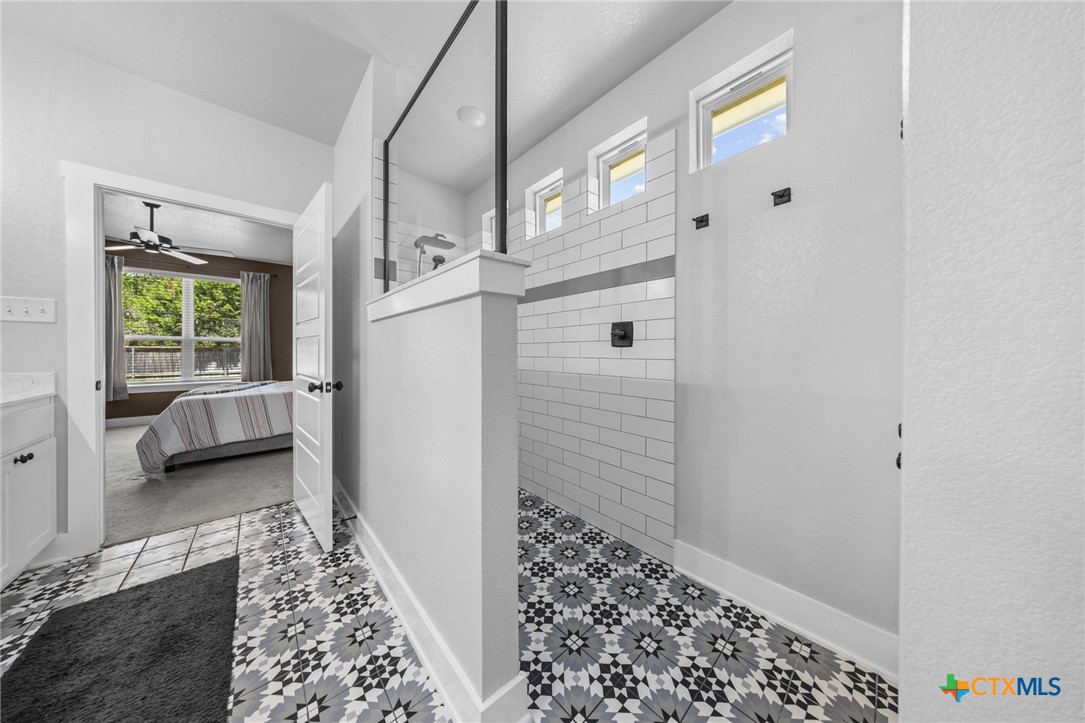 614 South Wheat Road Belton, TX 76513 - Photo 24 of 46 a bathroom with a sink and a shower