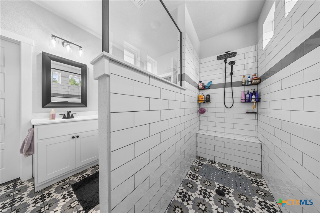 614 South Wheat Road Belton, TX 76513 - Photo 25 of 46 a bathroom with a sink toilet and mirror