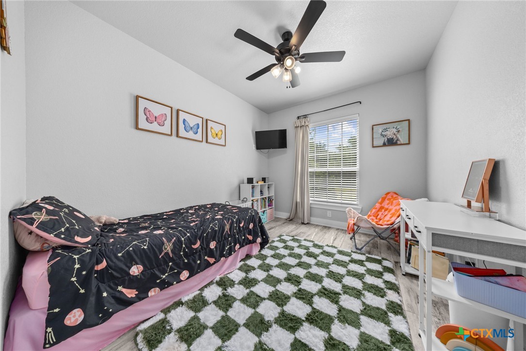 614 South Wheat Road Belton, TX 76513 - Photo 29 of 46 a bedroom with bed and a window