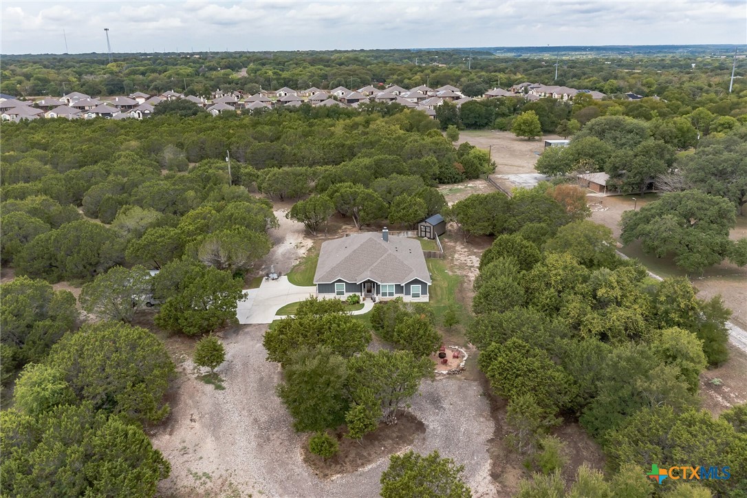 614 South Wheat Road Belton, TX 76513 - Photo 41 of 46 an aerial view of green landscape with trees houses and mountain view