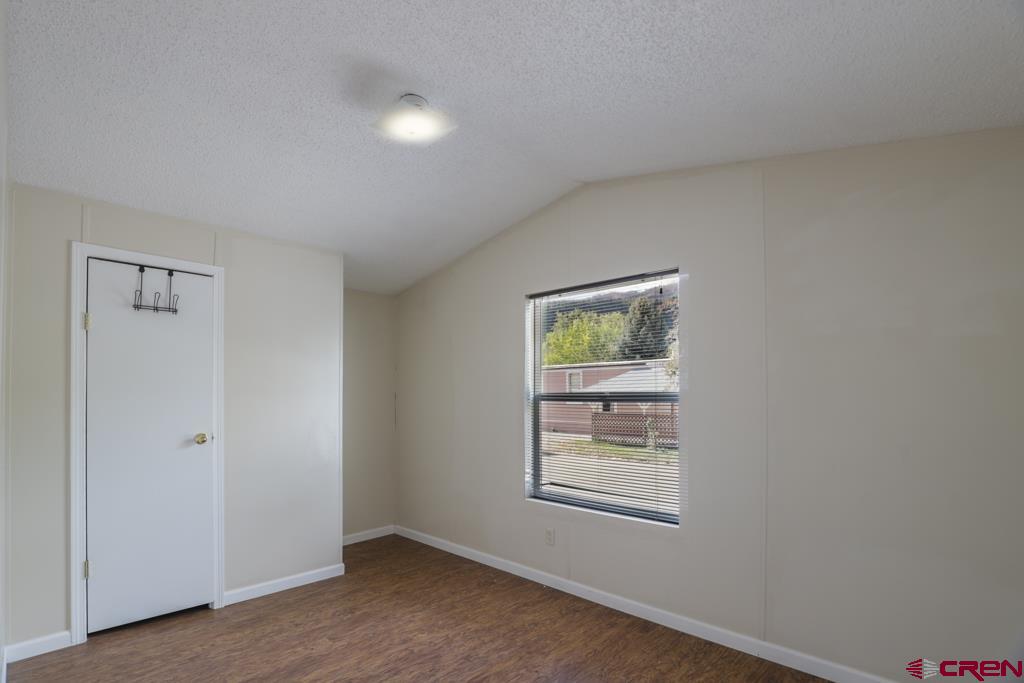 22 Huckleberry Lane Durango, CO 81301 - Photo 14 of 24 a view of an empty room with a window