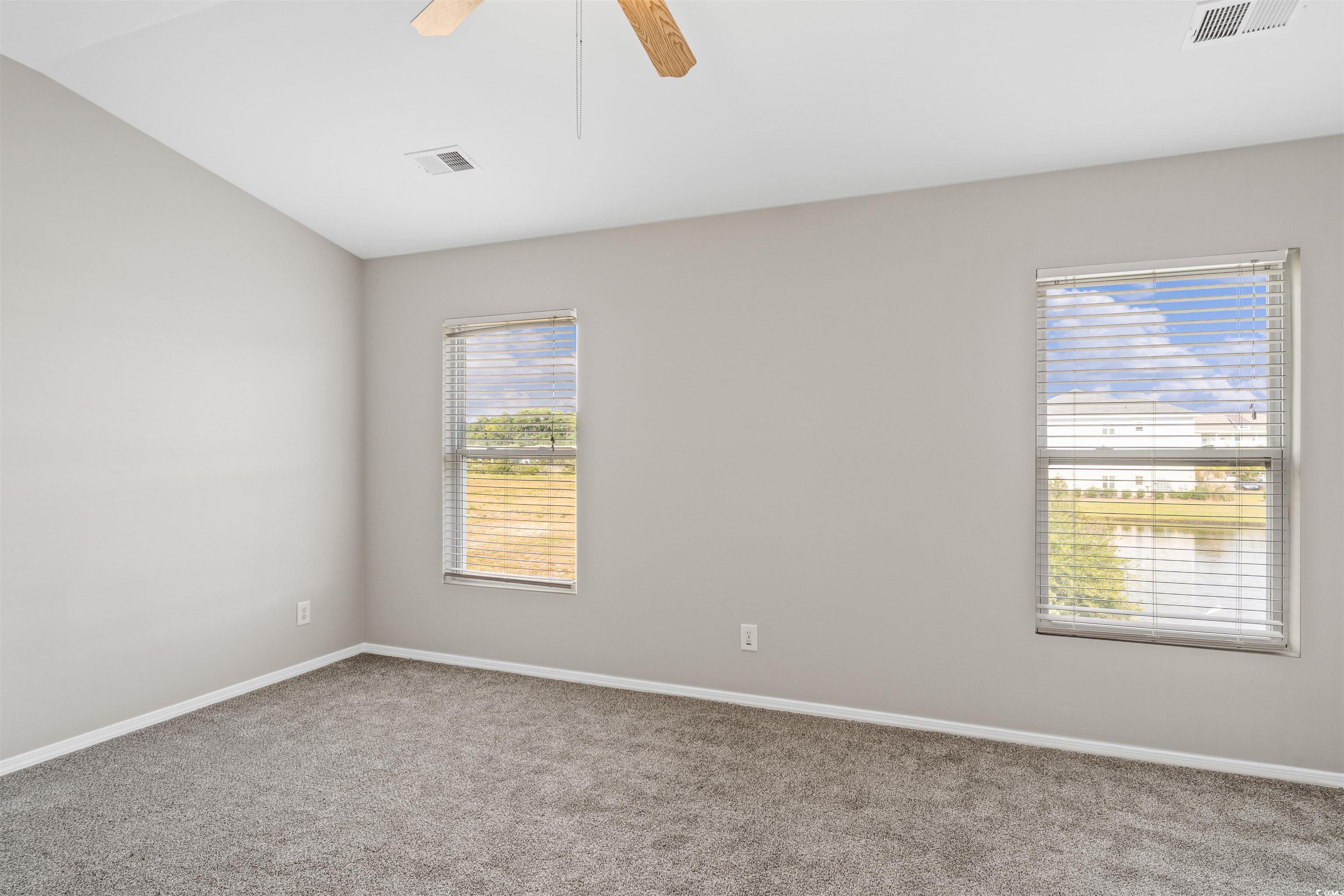 350 Kiskadee Loop, Unit B Conway, SC 29526 - Photo 14 of 40 Spare room with ceiling fan, carpet, and a wealth