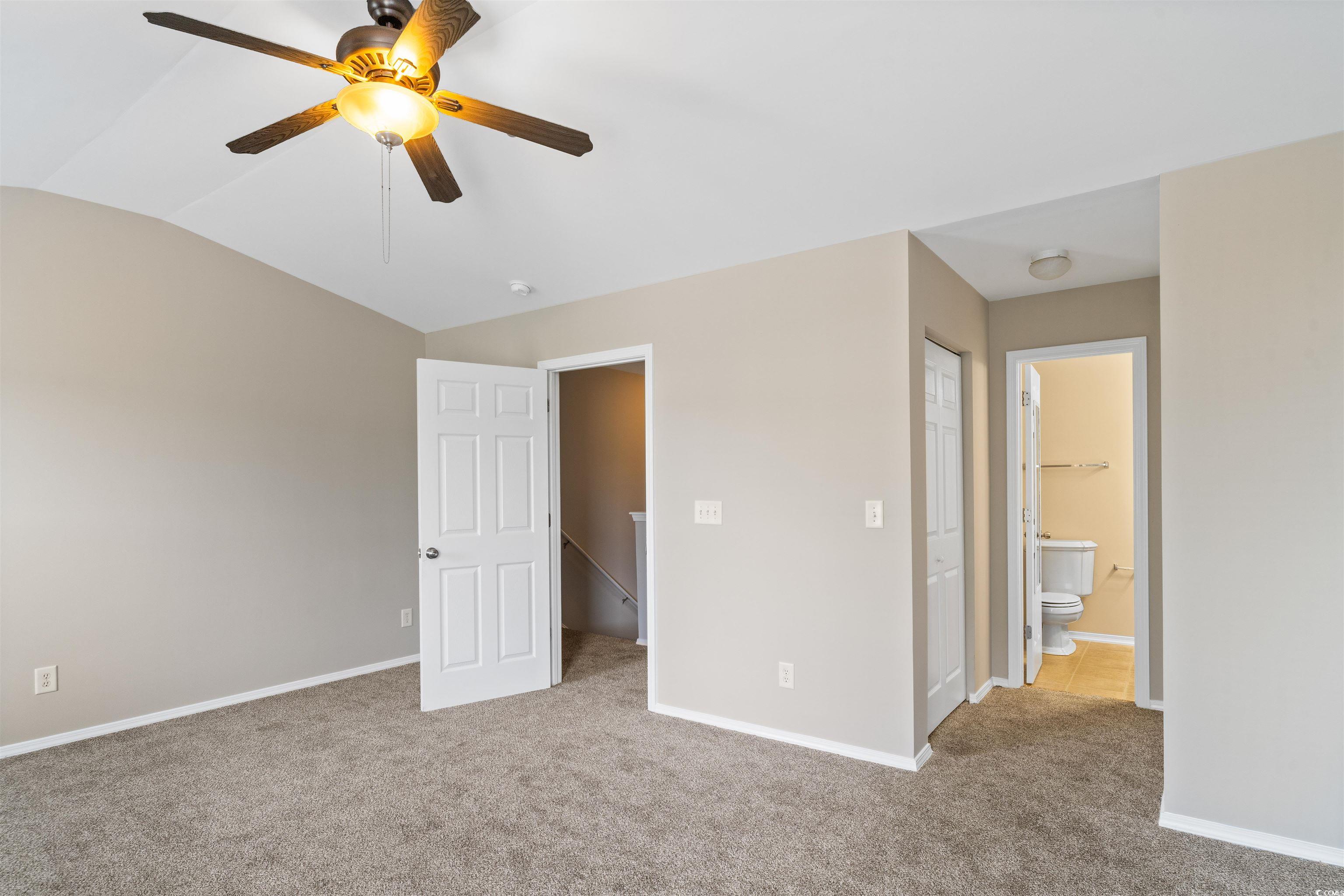 350 Kiskadee Loop, Unit B Conway, SC 29526 - Photo 15 of 40 Unfurnished bedroom featuring ceiling fan, a close